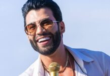 gusttavo-lima-da-selinho-em-idosa-e-a-carrega-no-colo-durante-show
